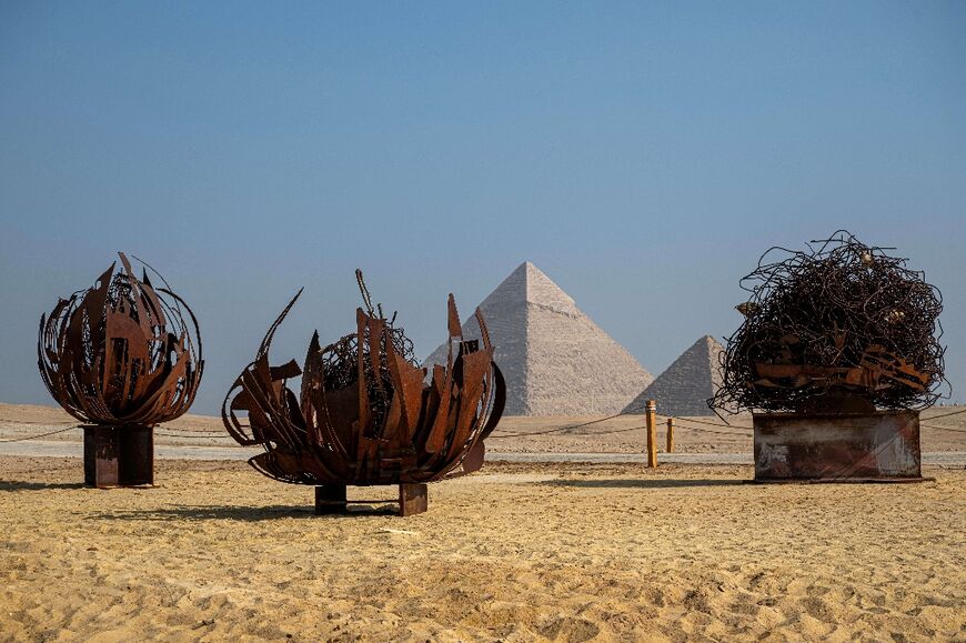 A view of the art installation "Desert Flowers" by artist Nadim Karam during the fifth edition of the "Forever is Now" art exhibition by Art d’Egypte at the Giza pyramids necropolis