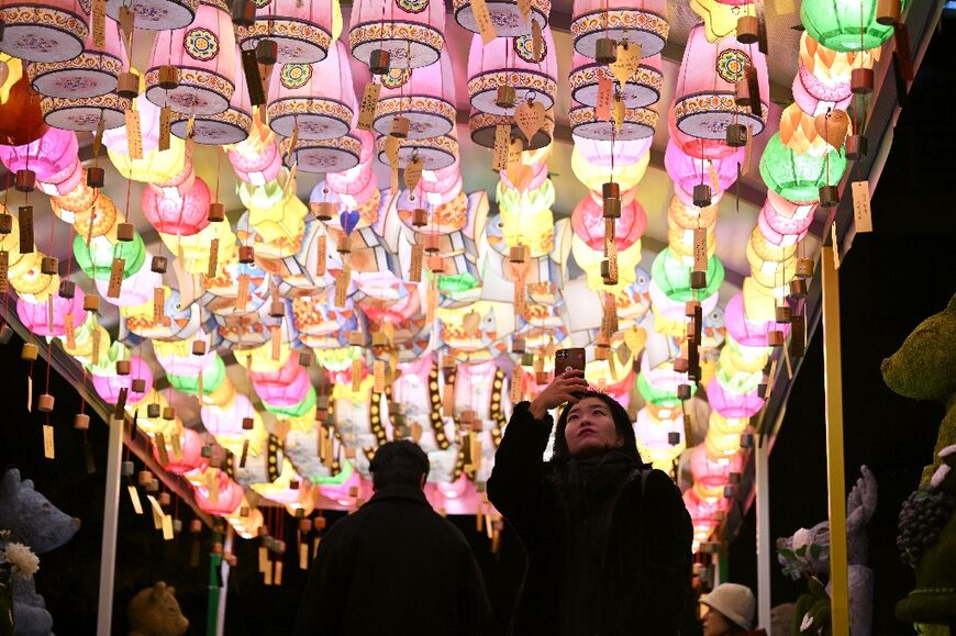Lanterns attached with New Year's wishes attracted Buddhist followers at the Jogyesa Temple in central Seoul as the clock counted down to the end of 2025