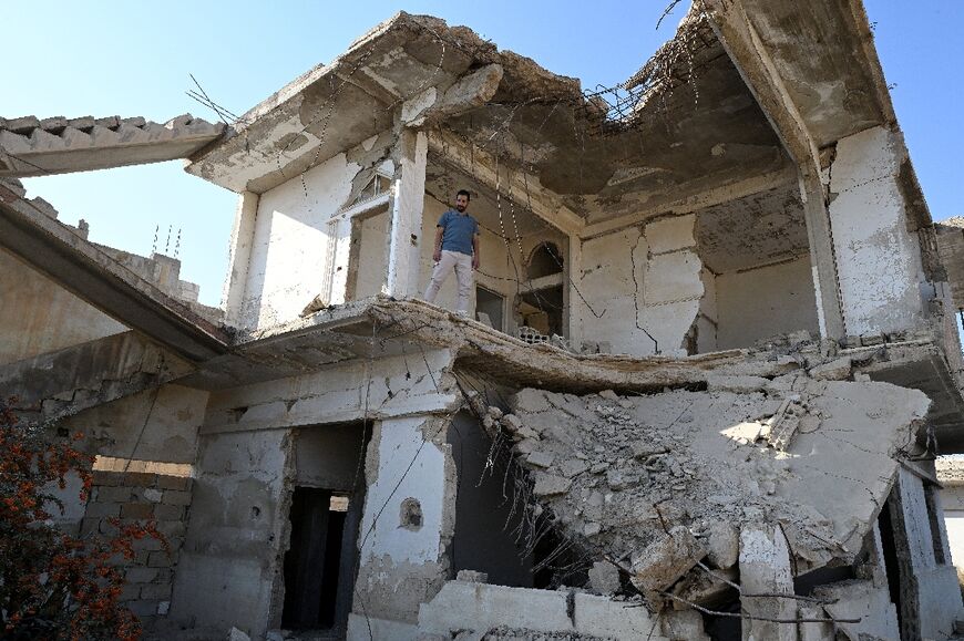 Ammar Ziadeh, co-founder of the independent newspaper Enab Baladi, in the ruins of its former offices
