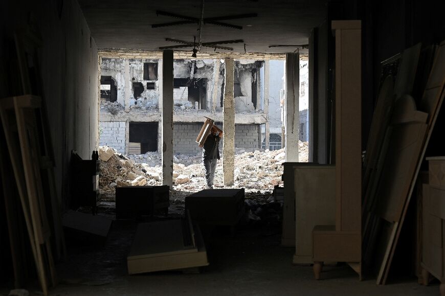 Carpenter Mohammed Nakkash wanted to bring his two children, born in exile in Turkey, back home to Daraya 