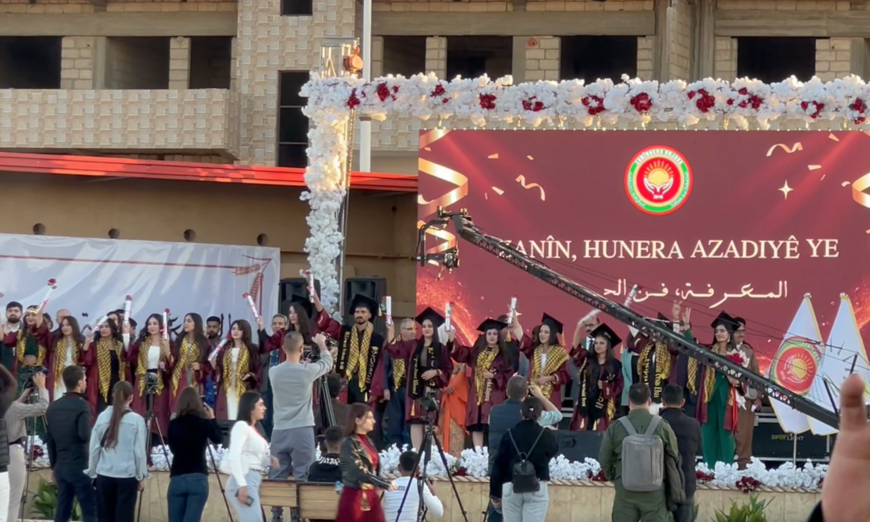 Nov. 22 2025  Qamishli Rojava University students wave their diplomas during graduation ceremony Amberin Zaman 