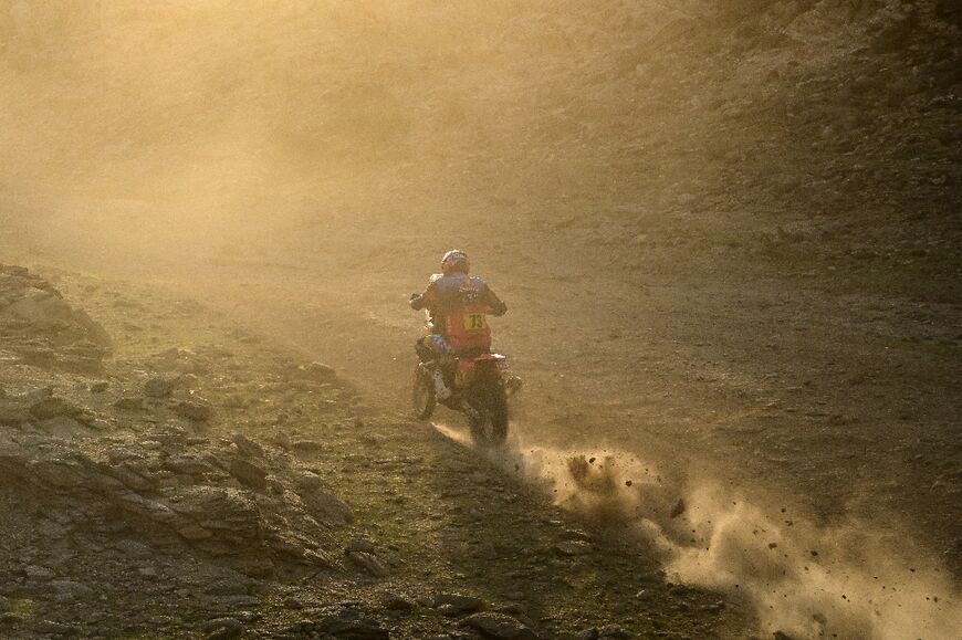 Spanish rider Edgar Canet won the prologue and Sunday's opening stage but lies second behind Daniel Spanish rider Edgar Canet kicks up the sand on his way to victory in Sunday's opening stage of the Dakar Rally 