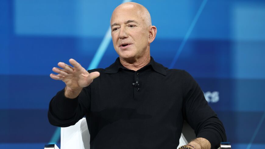  Jeff Bezos, founder and executive chairman of Amazon and owner of the Washington Post, speaks during the New York Times annual DealBook summit at Jazz at Lincoln Center on December 04, 2024, in New York City. 