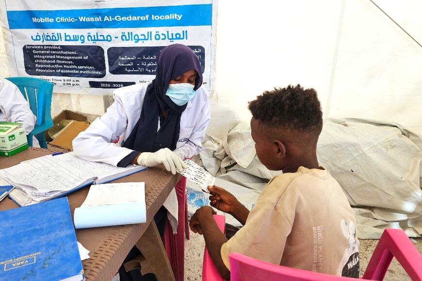 A displaced boy from the Heglig area receives medicine at a health tent in the Abu al-Naga displacement camp