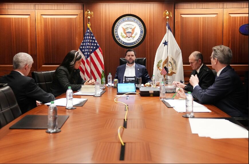 This official White House photograph shows US Vice President JD Vance (C), Director of National Intelligence Tulsi Gabbard (2L) and US Treasury Secretary Scott Bessent (R) in the Situation Room in Washington 