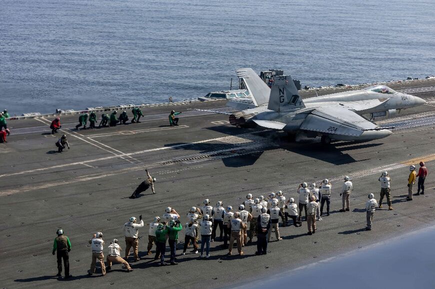 The US Navy handout picture shows jets operating on the USS Abraham Lincoln, part of a battle group operting in the Gulf region 