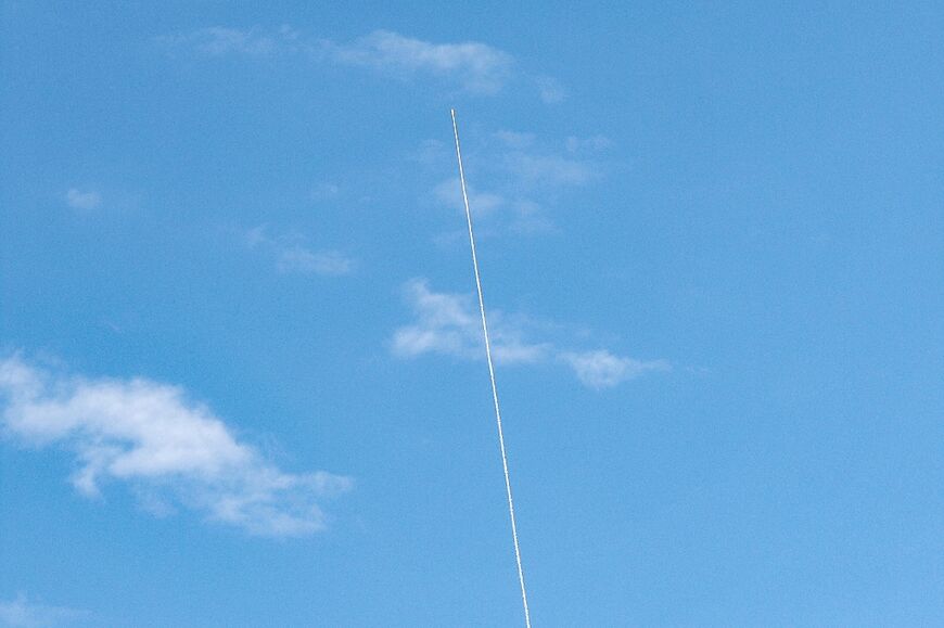 Rocket trails from Israel's Iron Dome missile defence system were seen over Tel Aviv 