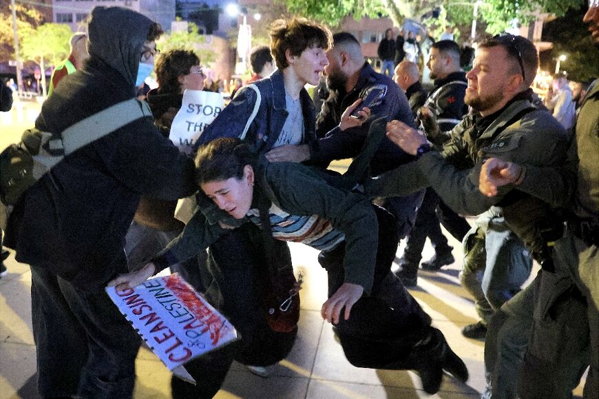 Anti-war protesters and Israeli security forces scuffled in Tel Aviv