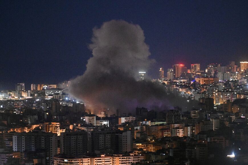Smoke rises from the site of an Israeli airstrike that targeted an area in Beirut's southern neighborhood