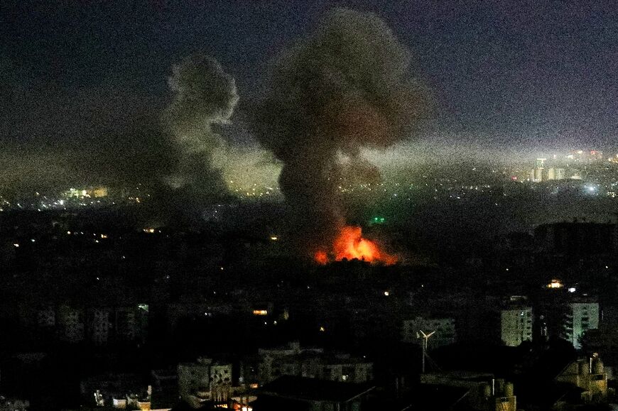 Smoke rises from the site of an Israeli airstrike that targeted an area in Beirut's southern suburbs on March 11, 2026