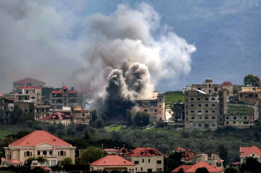 Smoke plumes rise following Israeli bombardment on the village of Khiam in southern Lebanon 