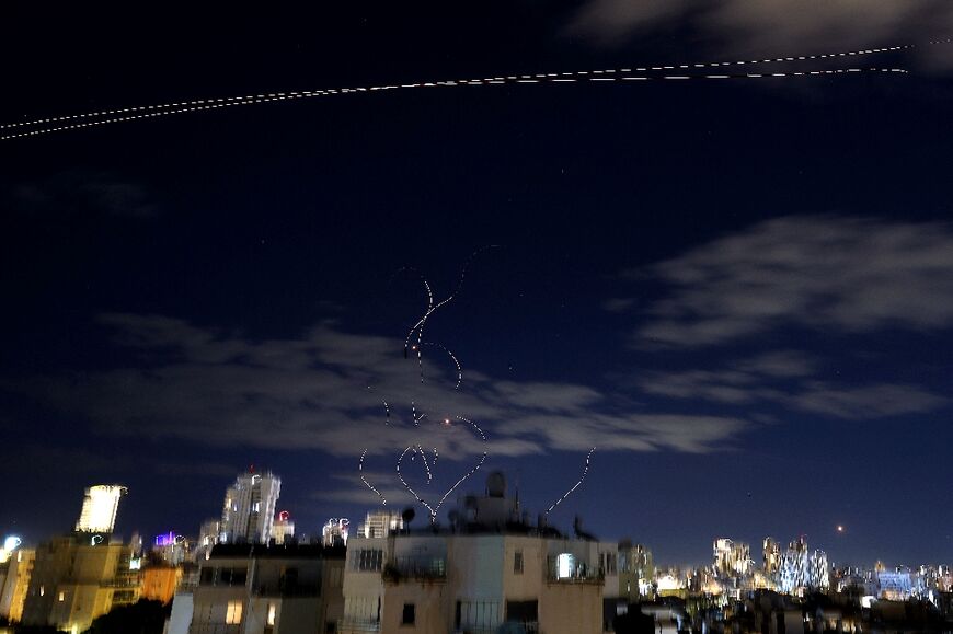 Rocket trails in the sky above the central Israeli coastal city of Netanya