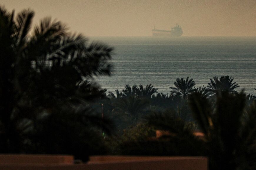 A tanker passes through the Strait of Hormuz, a key energy transport route, on February 25, 2026