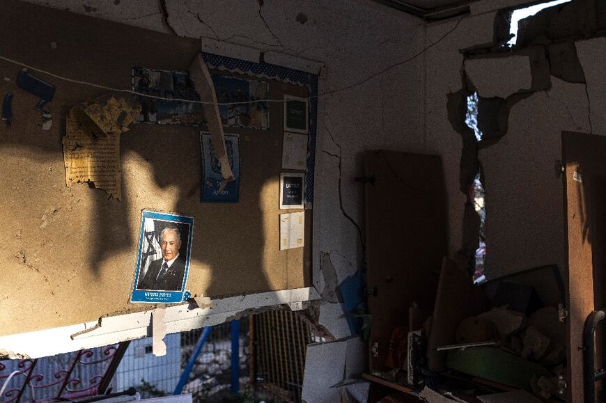 A portrait of Israeli Prime Minister Benjamin Netanyahu on the wall of a kindergarten damaged in an Iranian missile strike in Dimona on March 22
