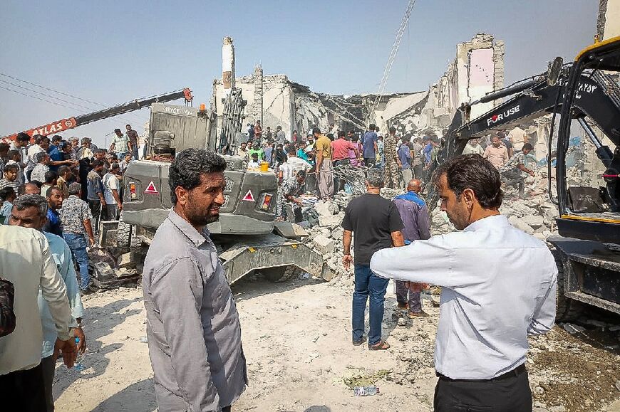 The site of a reported strike on a school in Minab, an image from Iran's ISNA news agency shows