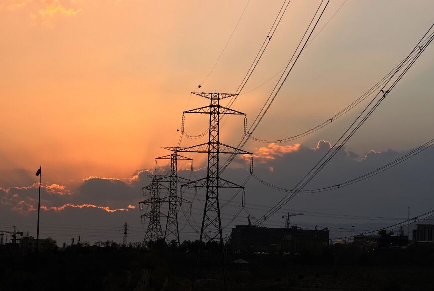 Power transmission towers at sunset in Tehran. US President Donald Trump said Tehran had 48 hours left to cut a deal or face "all Hell"
