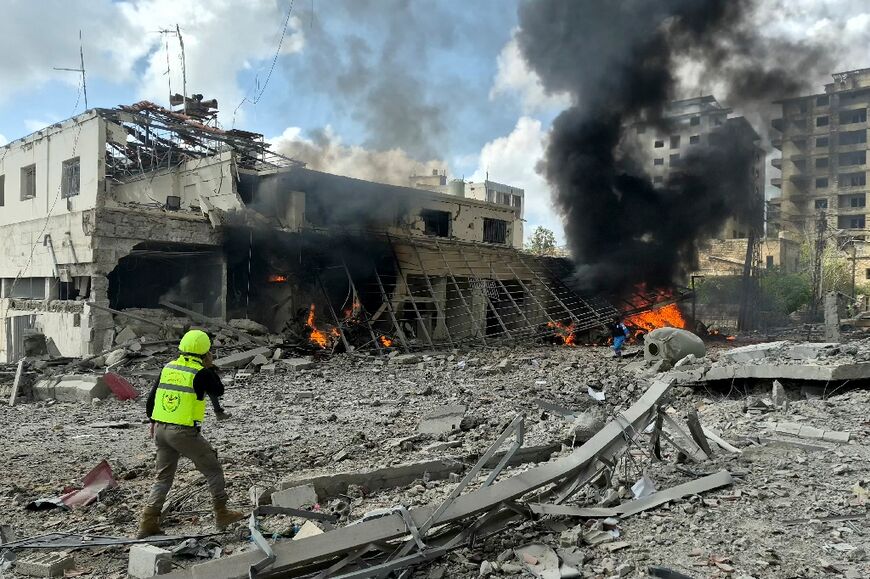 First responders at the site of an April 10, 2026 Israeli airstrike on the Lebanese State Security Center in the southern Lebanese city of Nabatieh