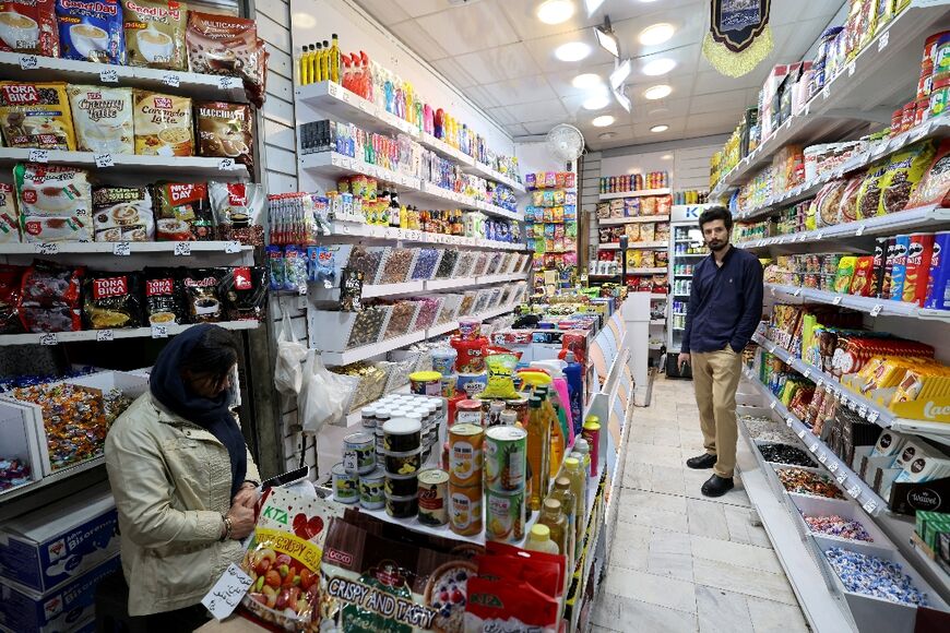 A man inside a shop at the Grand Bazaar in Tehran on March 30