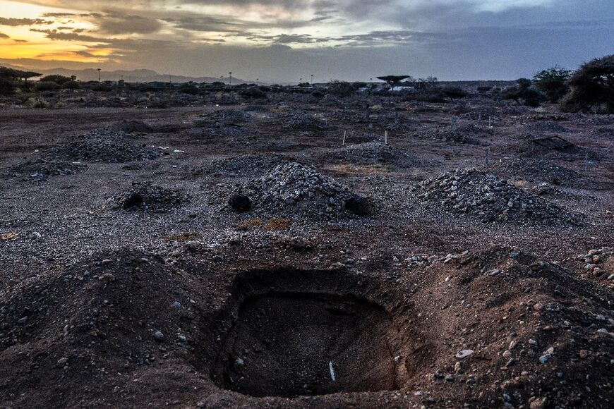 The unmarked graves of migrants at the cemetery in Obock
