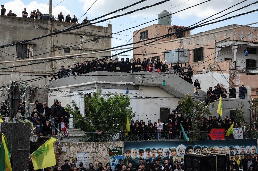 Gloom and sadness adorned faces in the crowd as mourners waited for the Hezbollah-organised ceremony to begin