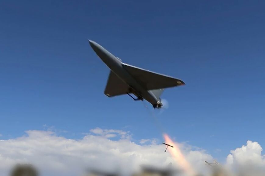 This grab taken from a video relesed by Iran's state broadcaster (IRIB) on April 6, 2026, show what it says are drones launched at US targets at Saudi Arabia's Al-Kharj base and Kuwait's Al-Adiri base.