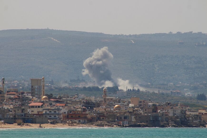Smoke rises from the site of an Israeli airstrike in the southern Lebanese village of Qlaile