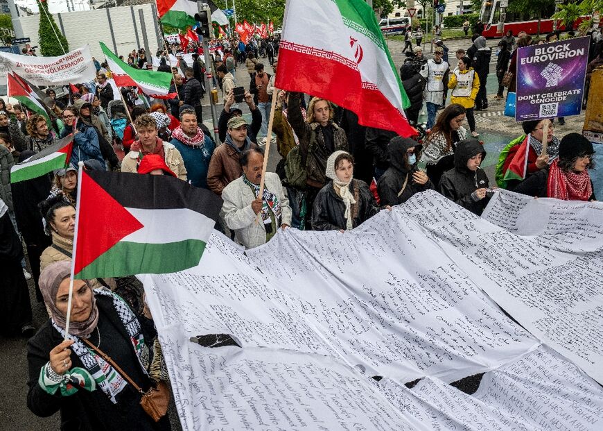 Participants waving Palestinian flags attended a demonstration entitled 'Song Protest Vienna 2026 - No Stage for Genocide'
