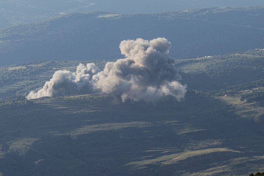 Smoke rises from the site of an Israeli strike that targeted the southern Lebanese village of al-Mahmoudiye on May 23