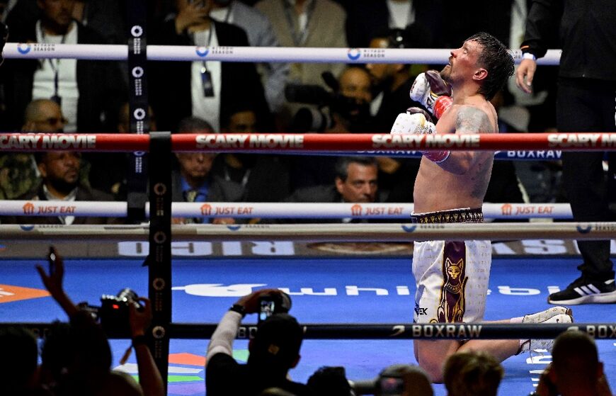 Ukraine’s Oleksandr Usyk celebrates his victory