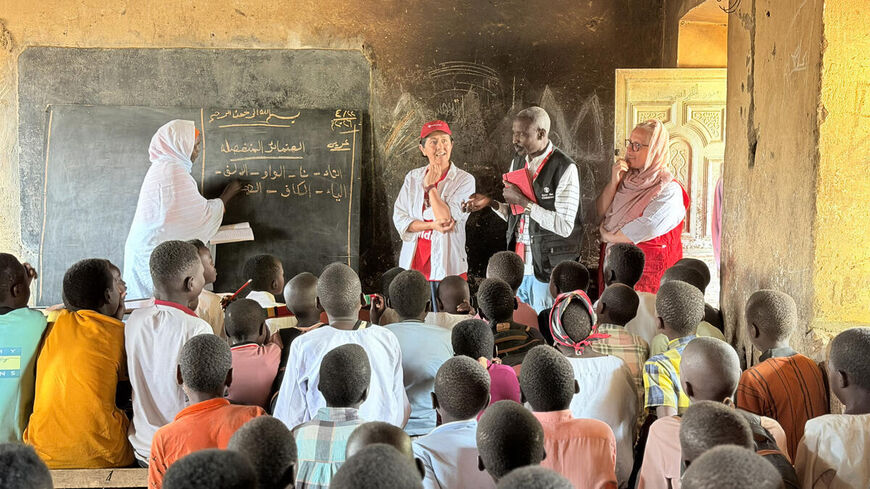 Janti Soeripto visits a school in Central Darfur that Save was able to reopen after two years of conflict. The school also serves as an informal shelter for displaced families and needs additional repairs to the roof and windows.