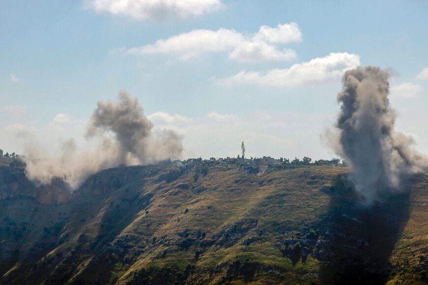 A photograph taken from the Marjayoun area in southern Lebanon shows smoke rising after an Israeli air strike on the village of Arnoun on May 30