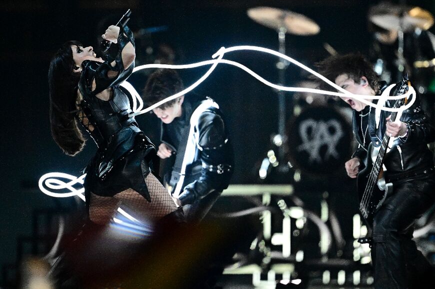 Romanian singer Alexandra Capitanescu and her band turned up the energy on the song 'Choke Me'
