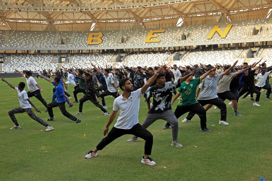 Youths attend an activity at Benghazi International Stadium in Benghazi on May 22, 2026