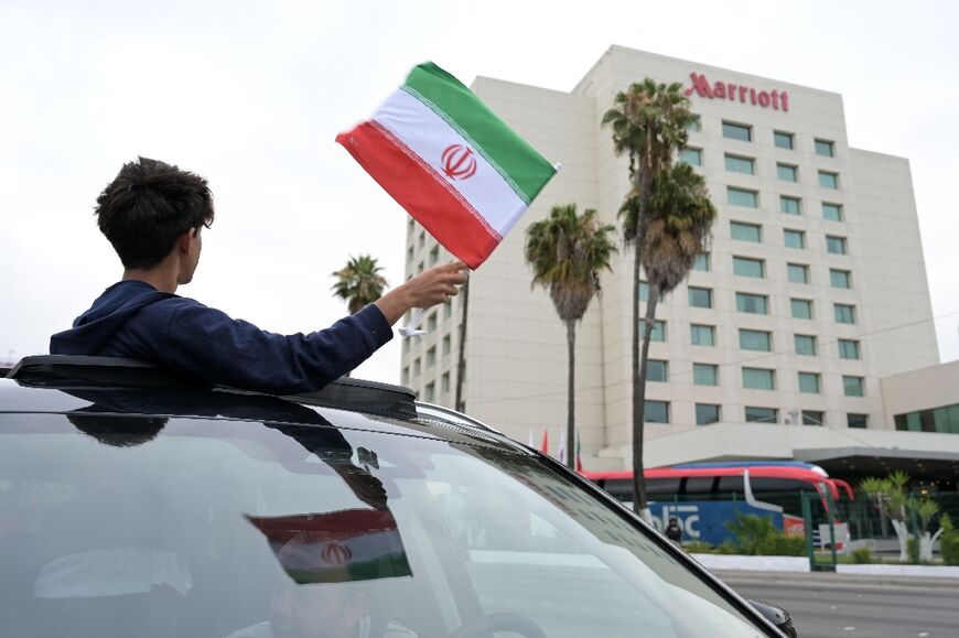 A small band of fans gathered to welcome the Iranian national football team to Mexico for the World Cup