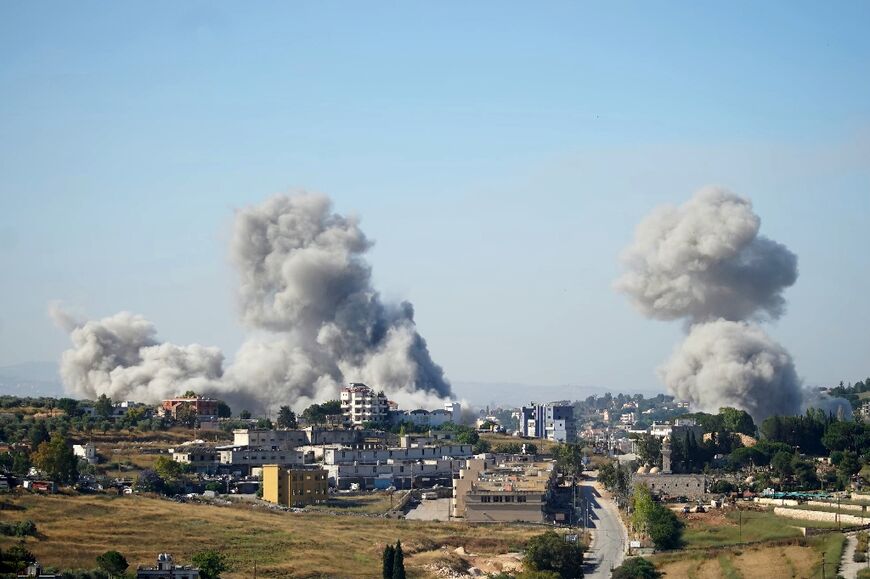 Smoke rises over the Lebanese city of Nabatieh after Israeli strikes carried out despite the announcement of a renewed ceasefire 