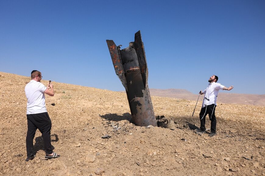 Iran fired some 30 missiles at Israel, some landing in the occupied territories