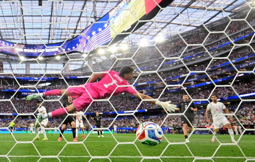 Iran midfielder Mohammad Mohebbi scores his team's second equaliser in a 2-2 draw with New Zealand in World Cup Group G