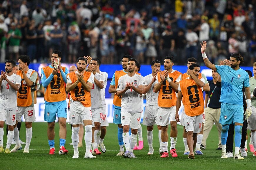 Iran's players wave to supporters after the 2026 World Cup Group G match between Iran and New Zealand