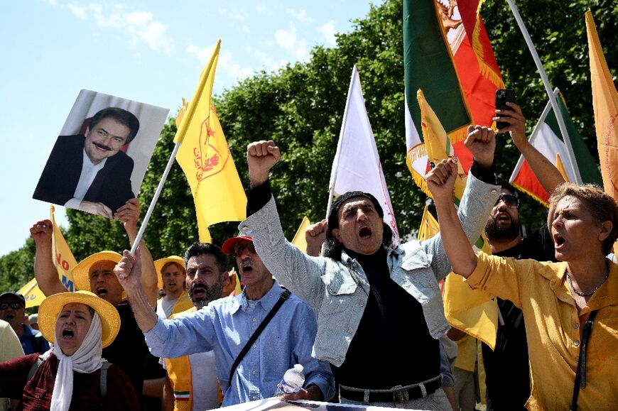 The protest was organised by Iranian diaspora groups, as well as French and international NGOs