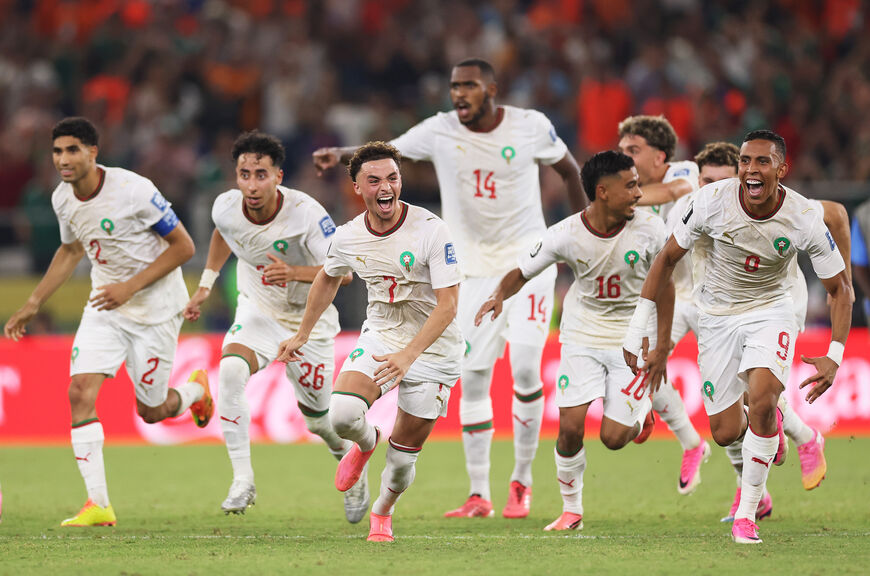 Players of Morocco dash as Ismael Saibari #11 of Morocco scores the team's fifth and winning penalty during hte penalty shootout in the FIFA World Cup 2026 Round of 32 match between Netherlands and Morocco at Monterrey Stadium on June 29, 2026 in Guadalupe, Mexico. (Photo by Carl Recine/Getty Images)