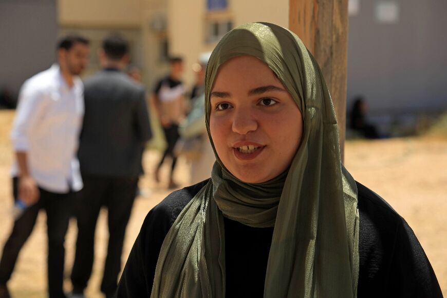 Ayesha al-Mogassbi, a 19-year-old student of English at the university, recalled hard times during the fighting