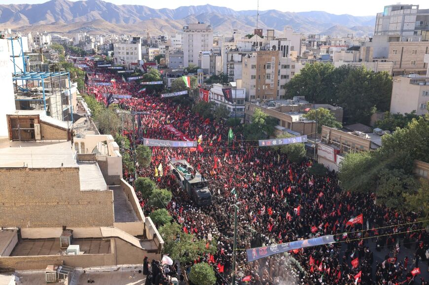 Large crowds gathered for the burial of Iran's slain supreme leader Ali Khamenei at the shrine of Imam Reza, Iran's most revered place of worship, in his home city of Mashhad