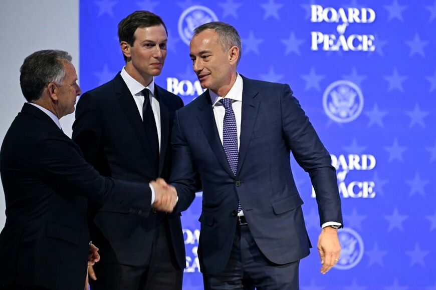 US Special Envoy Steve Witkoff (L) shakes hands with Nickolay Mladenov, Bulgarian High Representative for Gaza (R) next to US businessman Jared Kushner at the "Board of Peace" meeting during the World Economic Forum (WEF) annual meeting in Davos on January 22, 2026