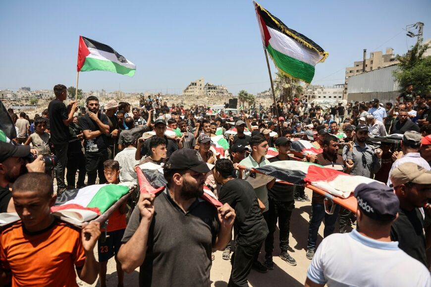 Tuesday's mass funeral was one of the largest ever organised in Gaza