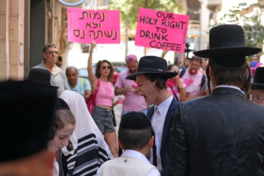 Ultra-Orthodox protesters demonstrate against Cafe Basimta operating on Shabbat, the weekly Jewish day of rest, as secular activists stage a counter-protest in support of the cafe, in central Jerusalem