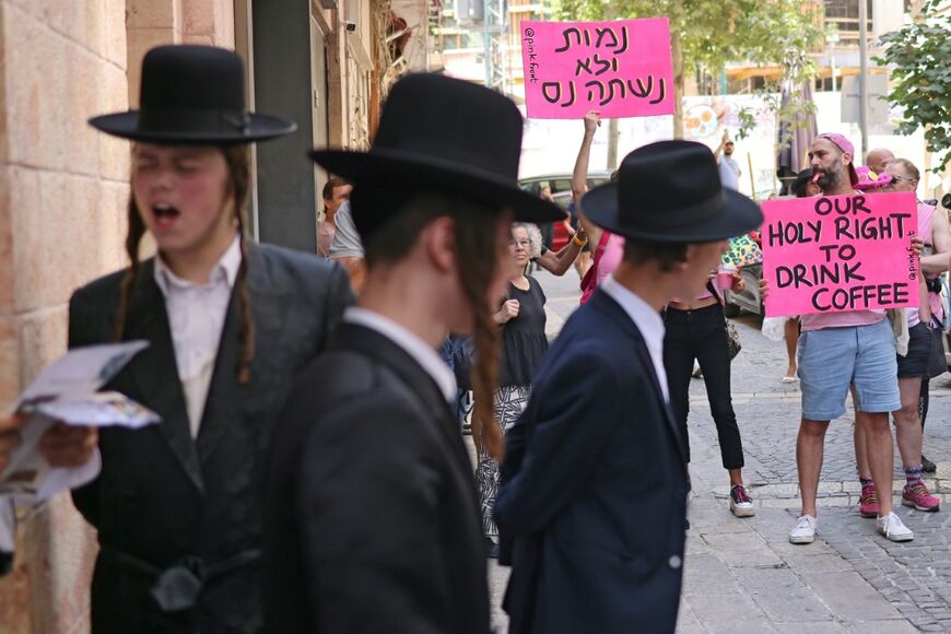 Ultra-Orthodox protesters demonstrate against Cafe Basimta operating on Shabbat, the weekly Jewish day of rest, as secular activists stage a counter-protest Jerusalem