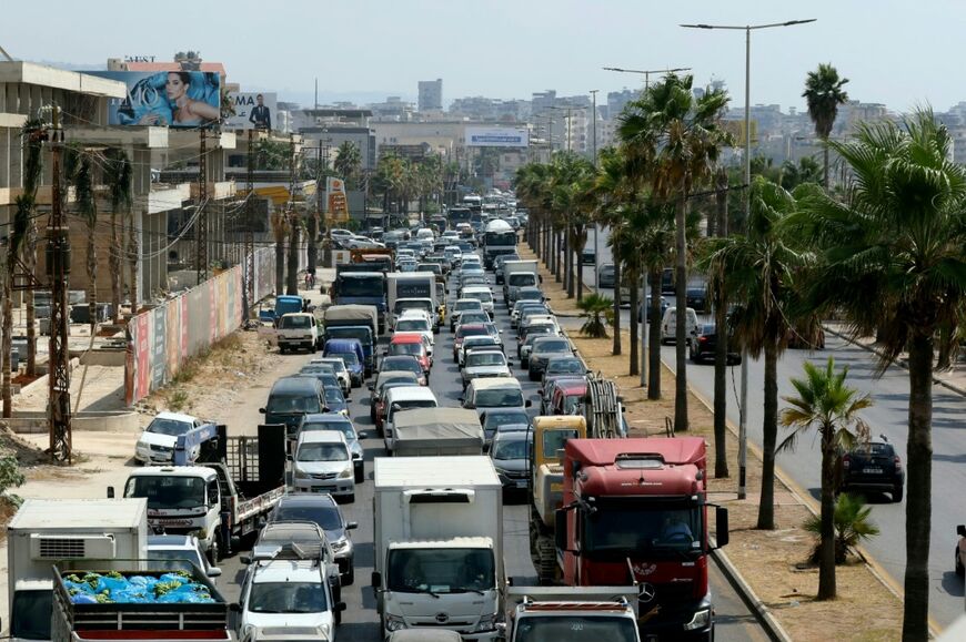 The road to Sidon was choked with traffic as some people fled their villages further south