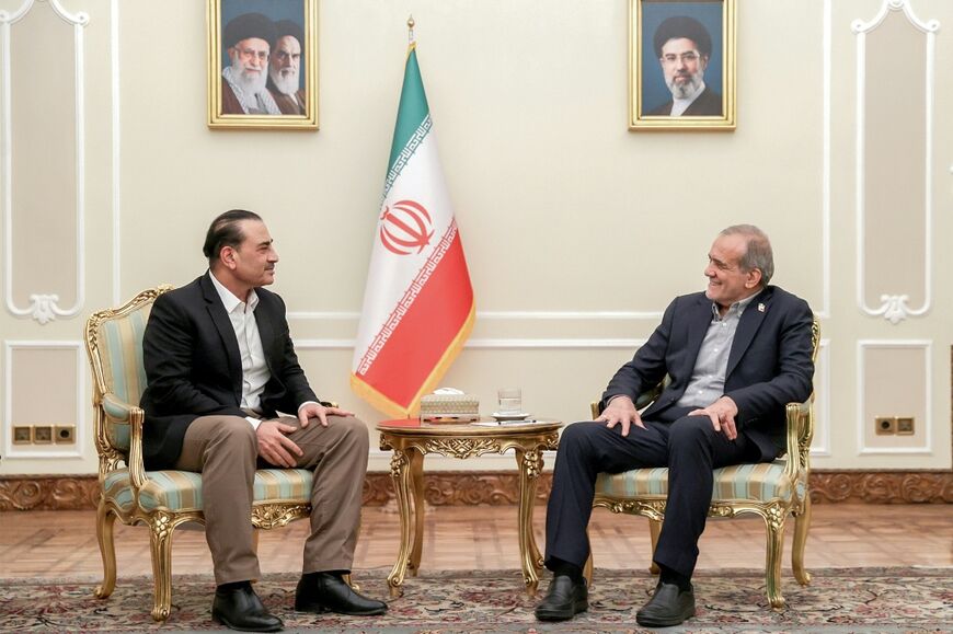 Pakistan's army chief Syed Asim Munir (L) has been a key mediator, and met on Monday with Iranian President Masoud Pezeshkian (R) in Tehran