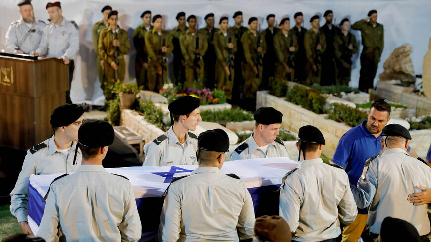 Israeli soldiers carry the coffin of Sgt. First Class Zachary Baumel during his funeral at the Mount Herzl military cemetery in Jerusalem, April 4 2019.