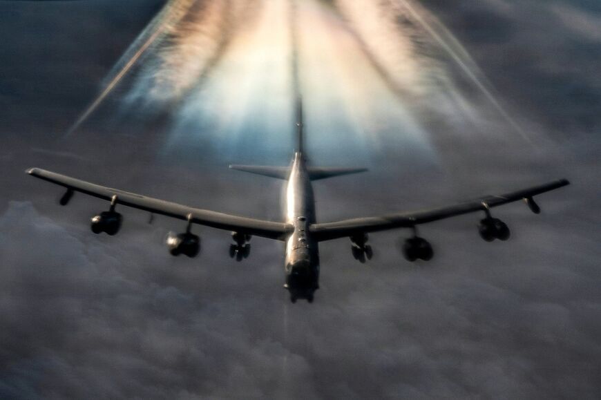 In this US Air Force handout photo released by US Central Command public affairs, a US Air Force B-52H Stratofortress bomber aircraft prepares to refuel from a KC-135 Stratotanker aircraft during Operation Epic Fury over the US Central Command area of responsibility on March 20, 2026. Seven KC-135s have been damaged since the start of the Iran war, according to the US Defense Department's inspector general.